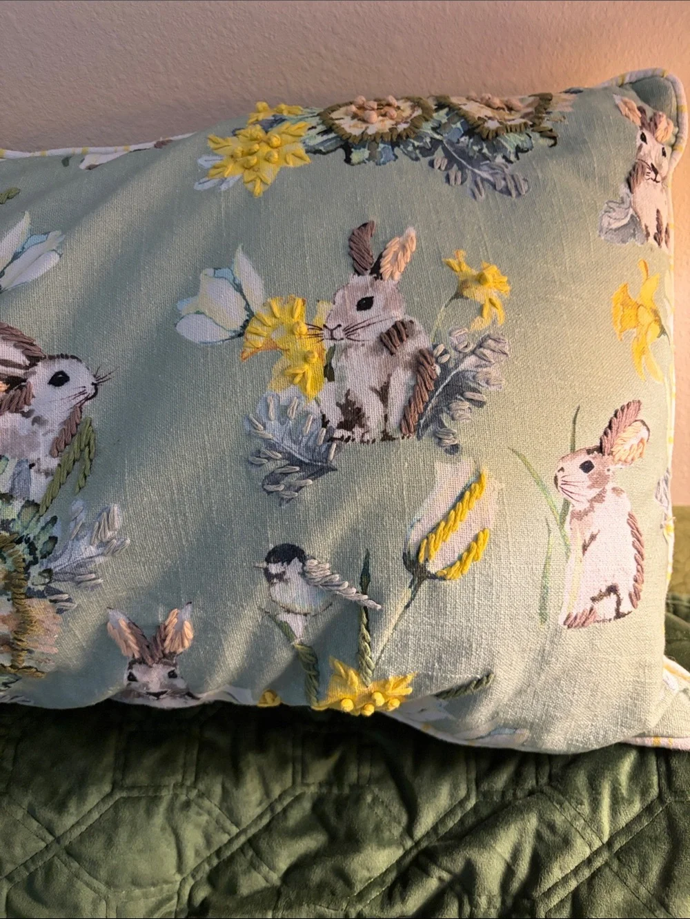 Accent pillow birds, daffodils,, tulips,rabbits in greens, yellows, blues,